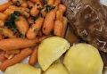 Gekookte Aardappelen, Wortelen, Varkensschouderlapje en Braadjus